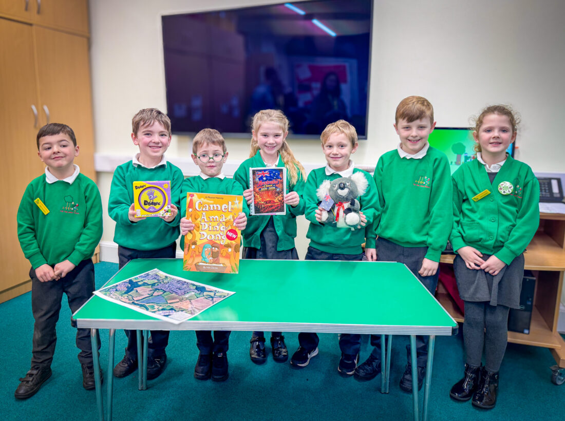 Fair Oak Infants school children showing items that were due to be buried in a time capsule