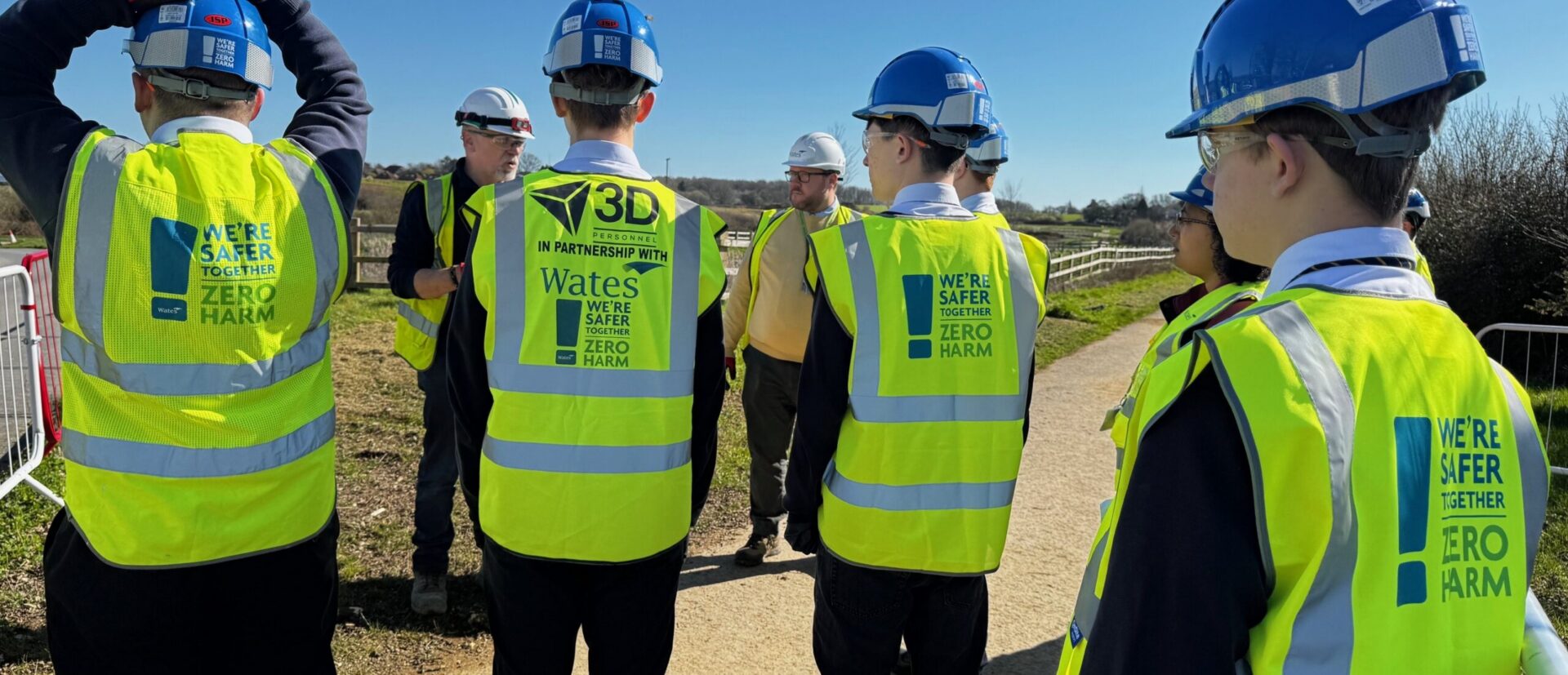 Secondary school students taking a tour on a construction site