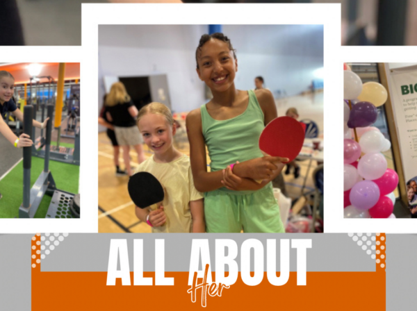 Girls holding table tennis racquets smiling with 'All About Her' Logo