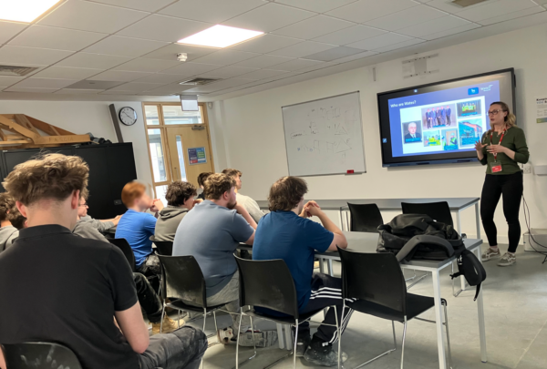 Bricklaying students at Eastleigh College watching a presentation